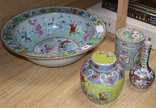 A 19th century Chinese famille rose basin, two jars and covers and a vase diameter 38cm